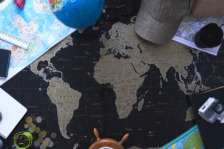 Black political map of the world. Still life of a traveler.の写真素材