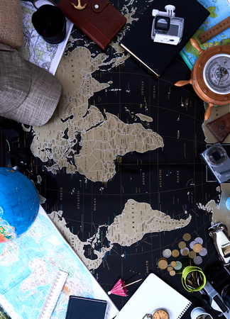 Black political map of the world. Still life of a traveler.の写真素材