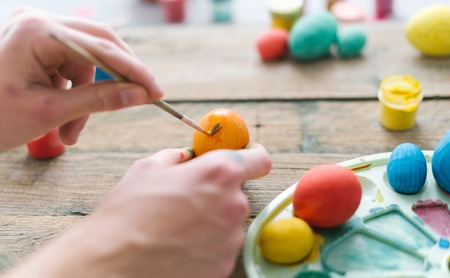 The process of painting Easter eggs. Preparing for Easter.の写真素材