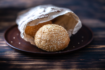 Burger buns on a black background.の写真素材