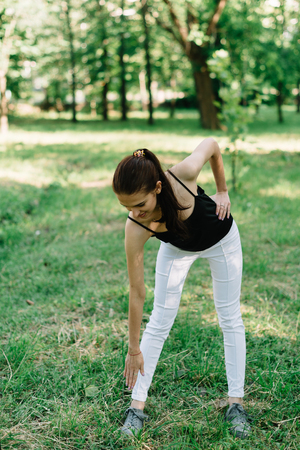 Girl athlete on the nature of yoga.の写真素材