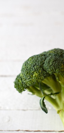 Fresh brocoli on a white wooden background.の写真素材