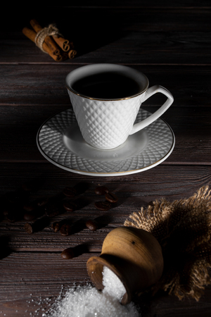 Cup of coffee on a dark wooden background.の写真素材