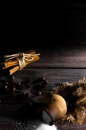 Small barrel with sugar on a wooden background.の写真素材