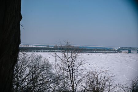 Bridge over the frozen river in Cherkassy.の写真素材