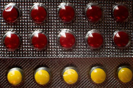 Colored pills close-up. Coronavirus vaccine concept.の写真素材