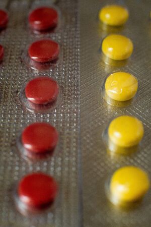 Colored pills close-up. Coronavirus vaccine concept.の写真素材