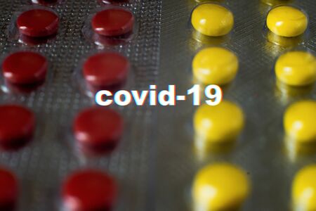 Colored pills close-up. Coronavirus vaccine concept.の写真素材