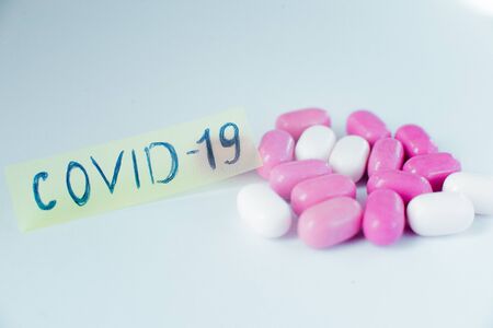 Colored pills close-up. Coronavirus vaccine concept.の写真素材