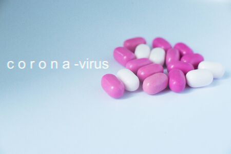 Colored pills close-up. Coronavirus vaccine concept.
