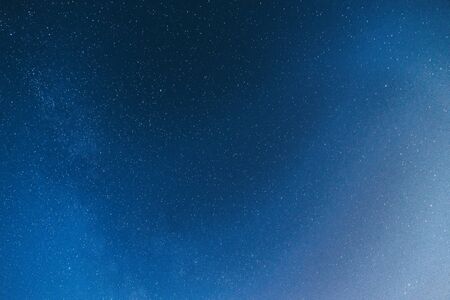 Night starry sky in the village in spring.の写真素材