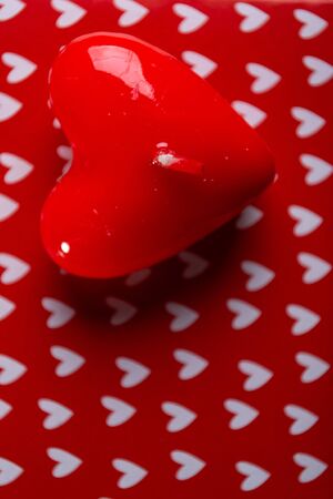 Red scented candles hearts on a black background.の写真素材