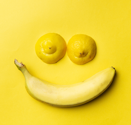 Pop art creative funny concept on yellow background.の写真素材