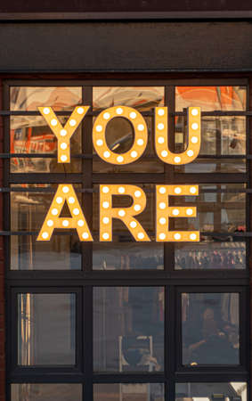 The inscription You are on the glass of a cozy cafeの写真素材
