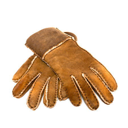 Brown warm fur suede gloves isolated on white background, winter equipe