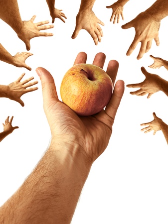 Hand Offering Juicy  Nutritious Apple to Communityの写真素材