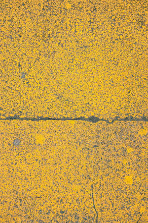 Paint on the Pavement in Yellow with the Lineの写真素材