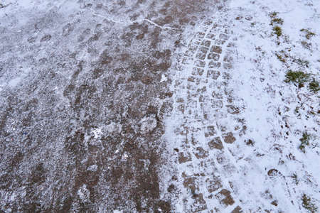 Cobblestone Road Covered with the Snowの写真素材