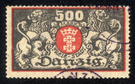 DANZIG - CIRCA 1923 A postage Stamp printing in Free City of Danzig (later Germany, now Gdansk, Poland) shows coat of arms of city, circa 1923のeditorial素材