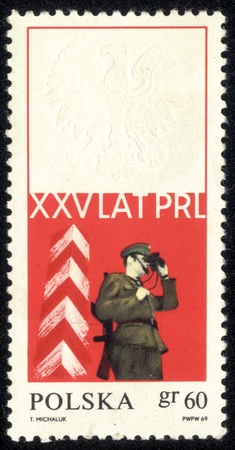 POLAND - CIRCA 1969 A stamp printed in POLAND shows XXV years of PRL, circa 1969のeditorial素材