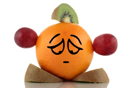 Diet problem. Funny fruits collection on white backgroundの写真素材