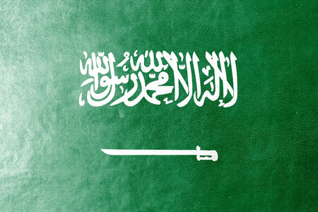 Saudi Arabia Flag painted on leather textureの写真素材
