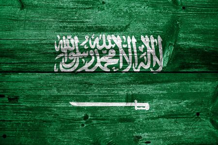 Saudi Arabia Flag painted on old wood plank textureの写真素材