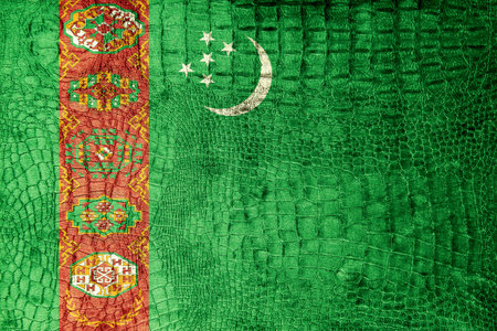 Turkmenistan Flag painted on luxury crocodile textureの写真素材