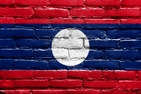 Laos Flag painted on brick wallの写真素材
