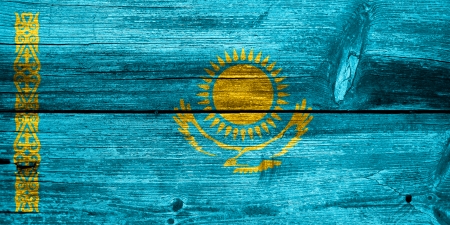Kazakhstan Flag painted on old wood plank textureの写真素材