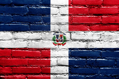 Dominican Republic Flag painted on brick wallの写真素材