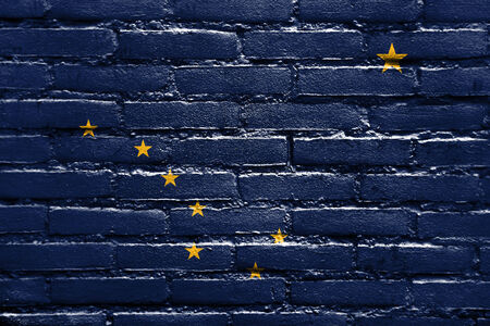 Alaska State Flag painted on brick wallの写真素材
