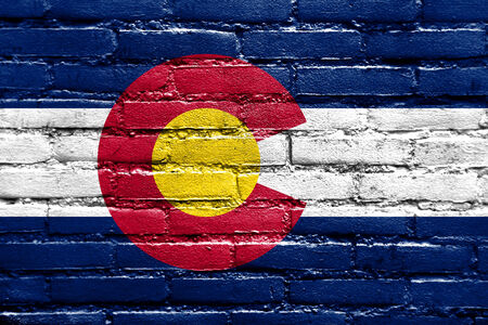 Colorado State Flag painted on brick wallの写真素材