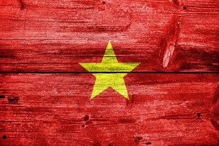 Vietnam Flag painted on old wood plank textureの写真素材