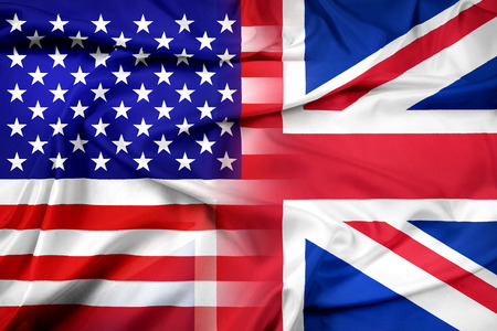 Waving USA and UK Flagの写真素材