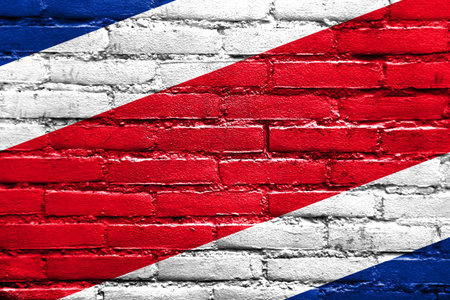 Costa Rica Flag painted on brick wallの写真素材