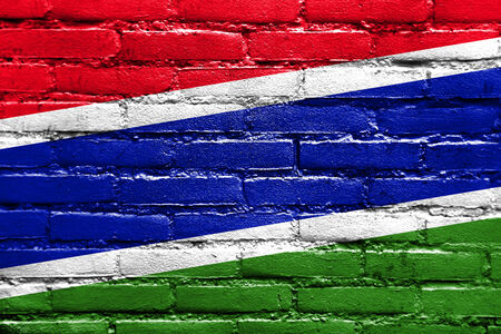 Gambia Flag painted on brick wallの写真素材