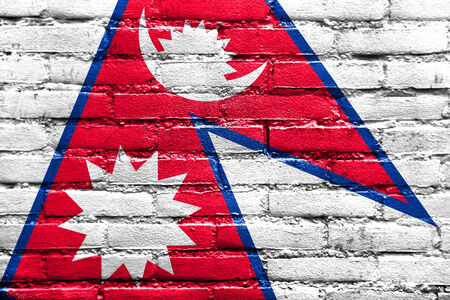 Nepal Flag painted on brick wallの写真素材