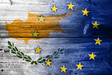 Cyprus and European Union Flag painted on old wood plank textureの写真素材