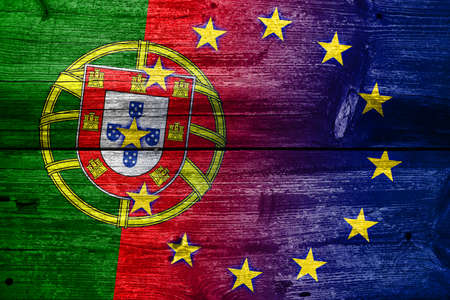 Portugal and European Union Flag painted on old wood plank textureの写真素材