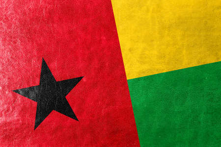 Guinea Bissau Flag painted on leather textureの写真素材