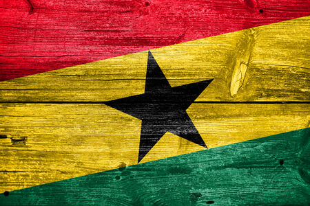 Ghana Flag painted on old wood plank textureの写真素材