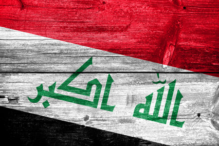 Iraq Flag painted on old wood plank textureの写真素材