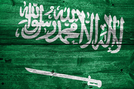 Saudi Arabia Flag painted on old wood plank textureの写真素材