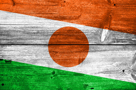 Niger Flag painted on old wood plank textureの写真素材
