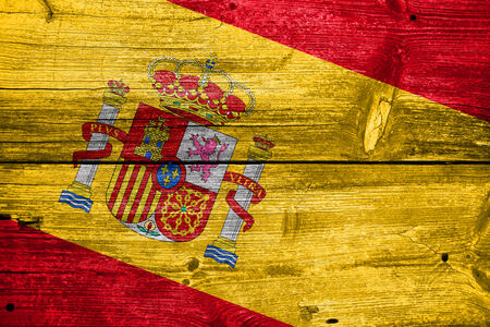 Spain Flag painted on old wood plank textureの写真素材
