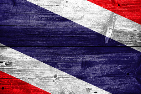 Thailand Flag painted on old wood plank backgroundの写真素材