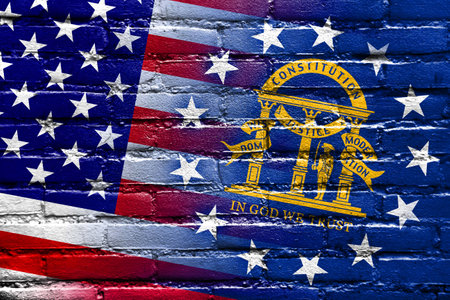 USA and Georgia State Flag painted on brick wallの写真素材