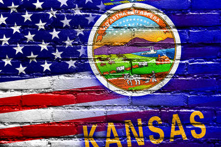 USA and Kansas State Flag painted on brick wallの写真素材