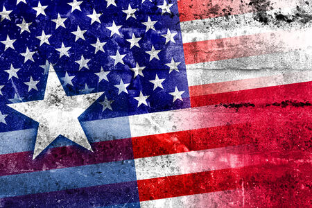 USA and Texas State Flag painted on grunge wall